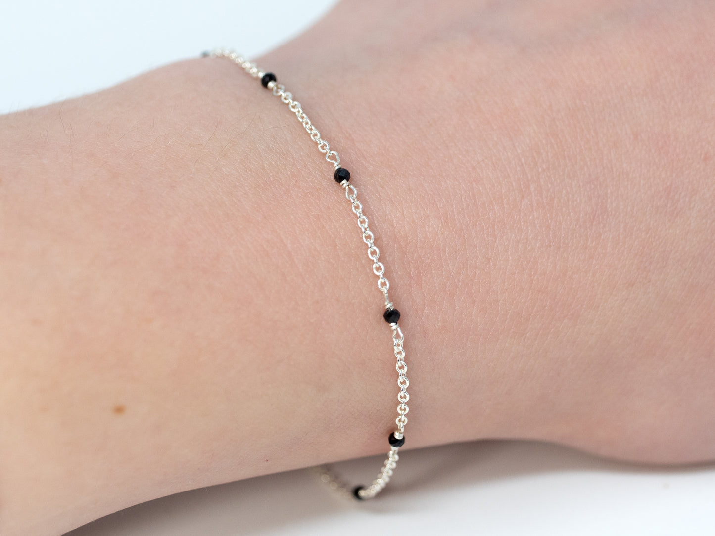 Black Spinel Station Bracelet in Sterling Silver at 7"