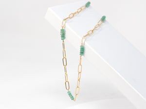 A gold-filled paperclip chain with emerald beads