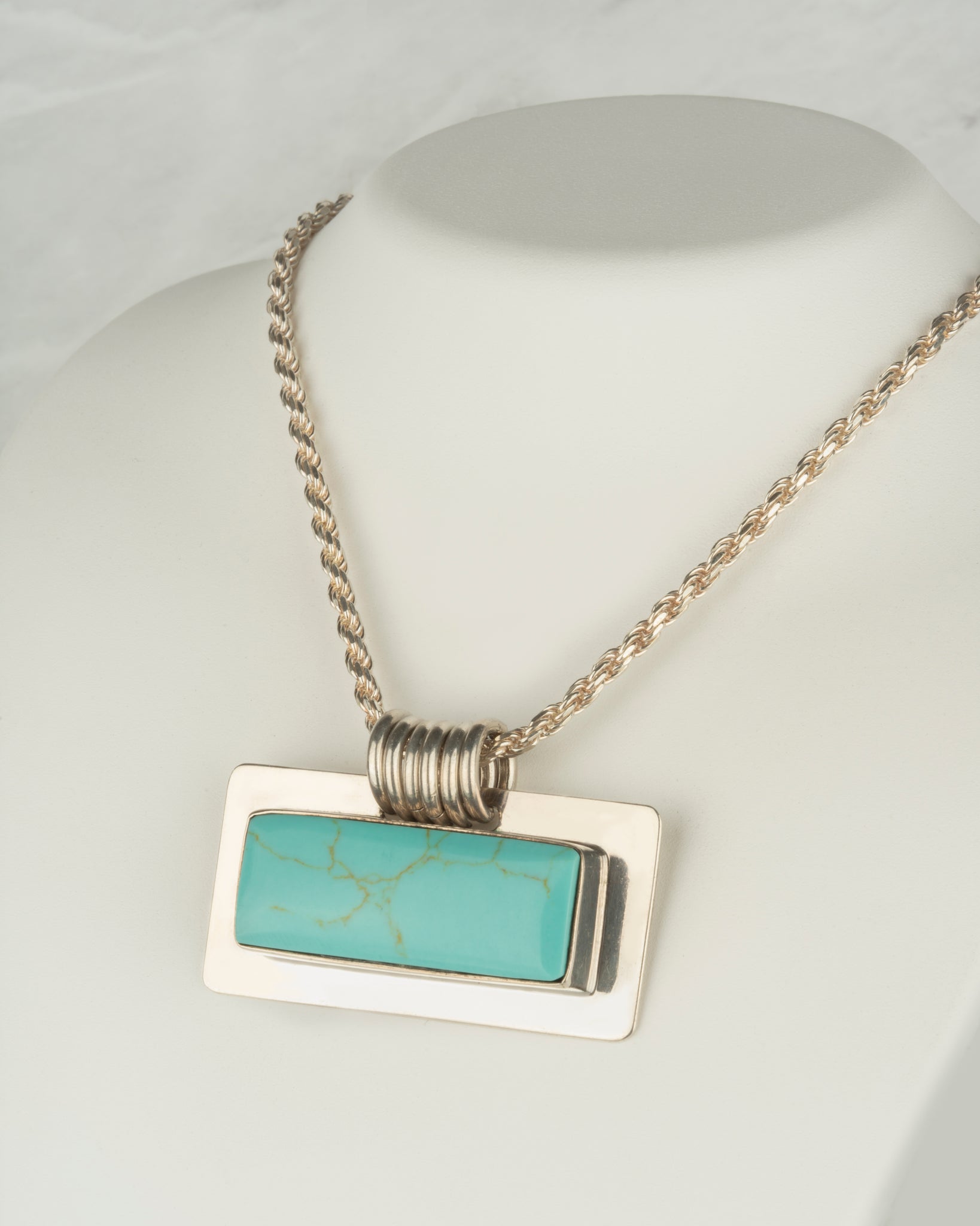 Rectangular Turquoise Cabochon Bezel Set Pendant in Sterling Silver