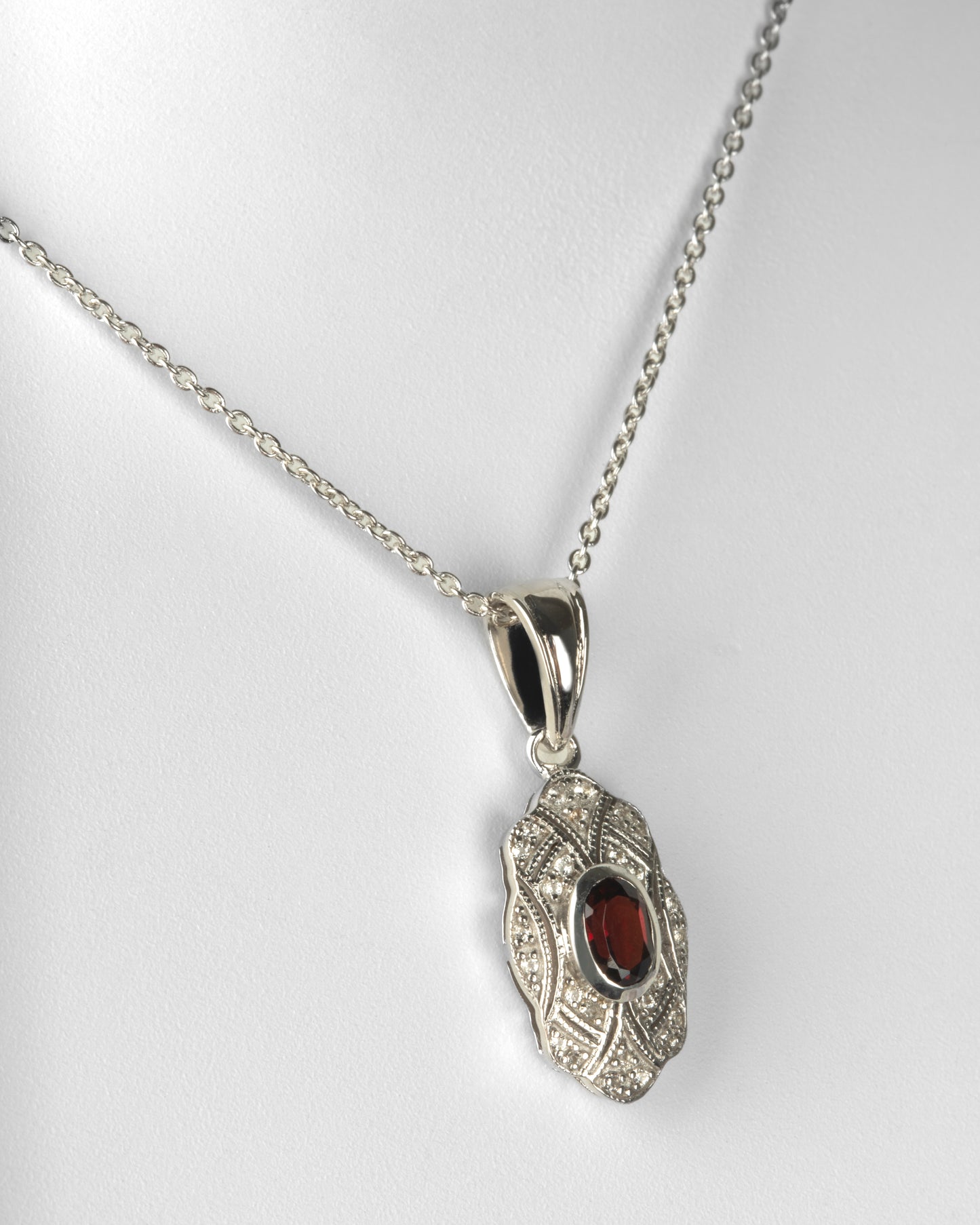 .63 ct. Oval Cut Garnet & Topaz Pendant in Sterling Silver with an 18" Cable Chain in Sterling Silver