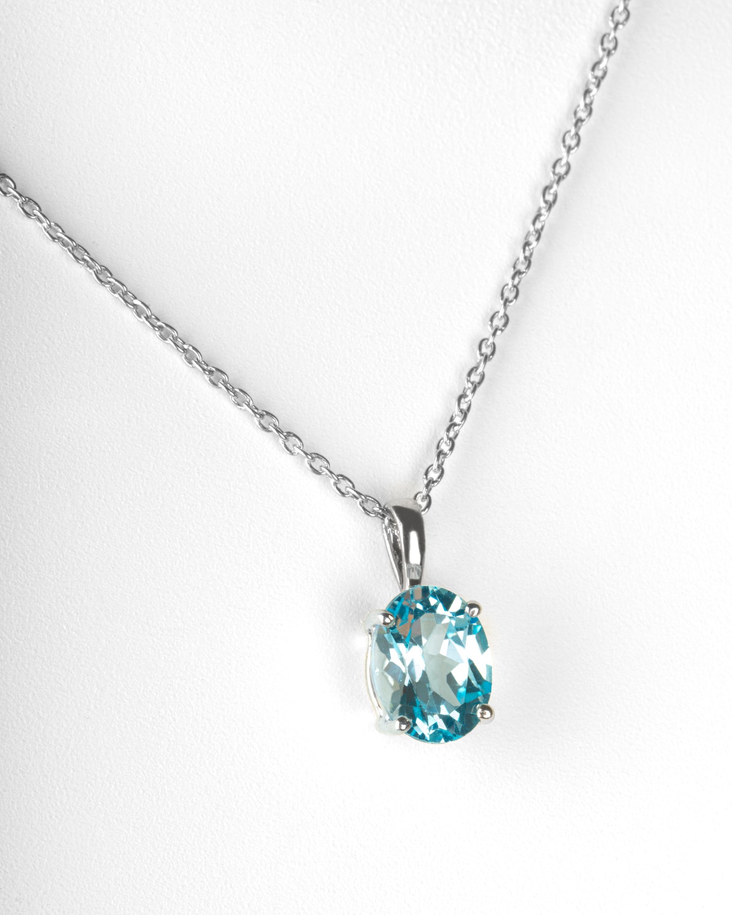 2 ct. Oval Blue Topaz Solitaire Basket Pendant in Sterling Silver with an 18" Cable Chain in Sterling Silver