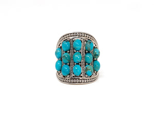 Oval Turquoise Cabochon Prong Set Statement Ring in Sterling Silver at a Size 7 1/2